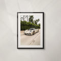 Green Flag: framed print of a Pagani Utopia at speed past green hedges