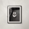Paddock: framed black and white aerial print of a Pagani in a cobbled courtyard